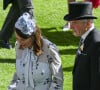 Il s'agit de la première apparition publique des parents de la princesse cette année.
Le prince William, prince de Galles, et ses beaux-parents, Michael et Carole Middleton assistent au deuxième jour des courses hippiques à Ascot, le 19 juin 2024. 