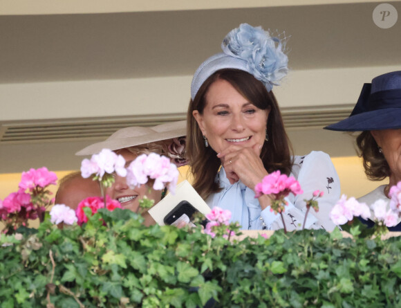 Le prince William, prince de Galles, et ses beaux-parents, Michael et Carole Middleton assistent au deuxième jour des courses hippiques à Ascot, le 19 juin 2024. 