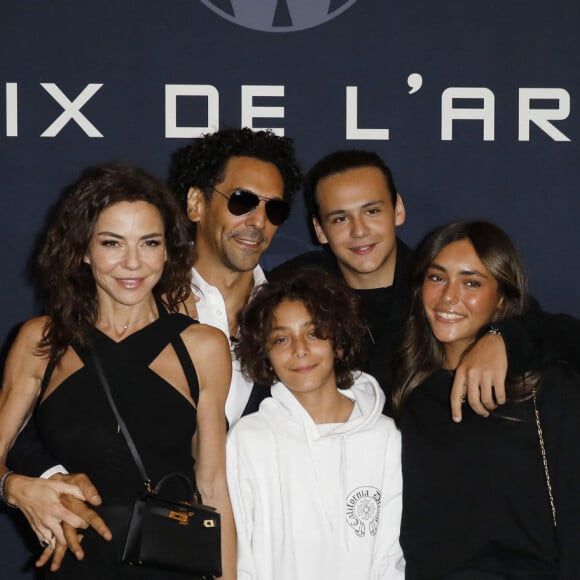 Sandra et Tomer Sisley avec leurs enfants Liv Shaya, Levin et Dino - Avant-Premiere du film "Largo Winch "Le Prix de L'argent" au cinéma le Grand Rex à Paris le 18 juin 2024. © Marc Ausset-Lacroix/Bestimage