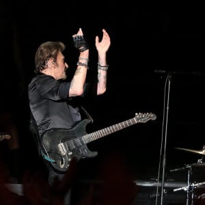 "Quand on se voyait, il adorait ses petits enfants. Une espèce de passion. Il donnait beaucoup d'attention. C'est aussi un très bon souvenir."
 
David Hallyday et Johnny Hallyday en concert au POPB de Bercy à Paris pendant la tournée "Born Rocker Tour", le 15 juin 2013