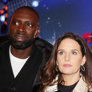 Omar Sy et sa femme Hélène au lancement de "1,2,3... Noël" lors de l'inauguration des vitrines et du sapin de Noël 2021 des Galeries Lafayette Haussmann 2021 à Paris, le 17 novembre 2021