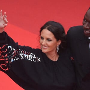 "La France, ce pays merveilleux qui interdit le port du voile aux sportives, mais qui autorise la participation d'un pédocriminel". Une publication qui montre l'avis de la femme d'Omar Sy concernant leurs choix concernant les concurrents.
Omar Sy et sa femme Hélène - Montée des marches du film " Top Gun : Maverick " lors du 75ème Festival International du Film de Cannes. Le 18 mai 2022 © Giancarlo Gorassini / Bestimage 