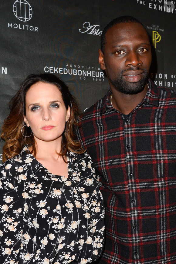 Omar Sy et sa femme Hélène au vernissage de l'exposition "Vision by AG", au profit de l'association caritative CeKeDuBonheur, à la Piscine Molitor à Paris, le 30 novembre 2016. © Guirec Coadic/Bestimage 