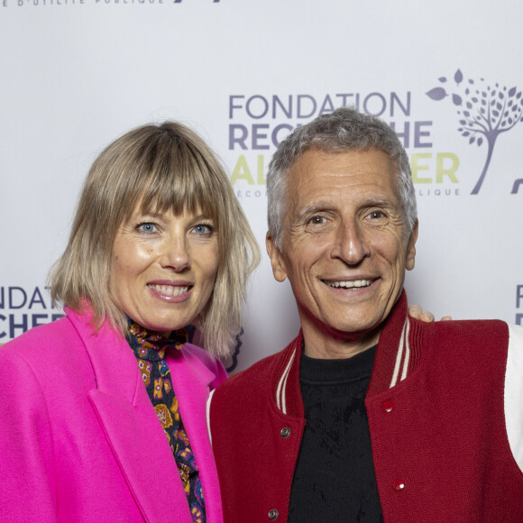 Nagui et sa femme Mélanie Page au photocall du concert du gala des 20 ans de la fondation Recherche Alzheimer "2 générations chantent pour la 3ème" à l'Olympia à Paris le 18 mars 2024. © Cyril Moreau / Bestimage 