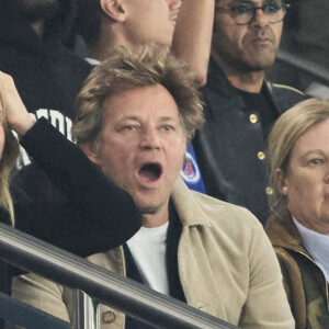 Alice Taglioni et son compagnon Laurent Delahousse et Hélène Darroze dans les tribunes de la demi-finale retour de Ligue des champions entre le PSG face au Borussia Dortmund (0-1) au Parc des Princes à Paris le 7 mai 2024