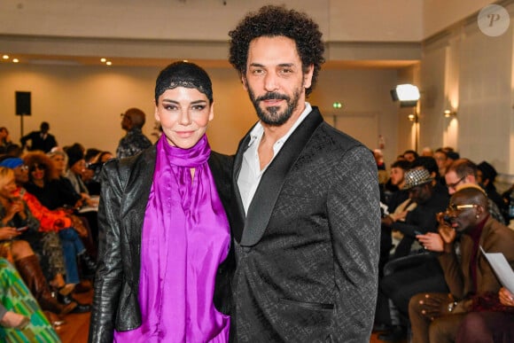 Tomer Sisley et Sandra Zeitoun assistent au défilé Imane Ayissi Haute Couture Printemps/Été 2024 dans le cadre de la semaine de la mode à Paris le 22 janvier 2024. Shootpix/ABACAPRESS.COM