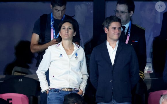 Amélie Oudéa-Castéra et Gabriel Attal - Célébrités assistent à la victoire de Léon Marchand qui devient champion Olympique sur 400 m 4 nages lors des Jeux Olympiques de Paris 2024 (JO) à Paris La Defense Arena à Nanterre le 28 juillet 2024. © Dominique Jacovides-Pierre Perusseau/Bestimage 