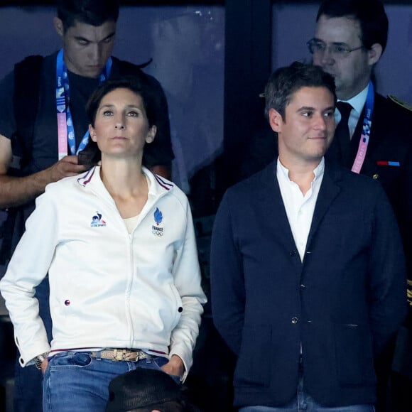 Amélie Oudéa-Castéra et Gabriel Attal - Célébrités assistent à la victoire de Léon Marchand qui devient champion Olympique sur 400 m 4 nages lors des Jeux Olympiques de Paris 2024 (JO) à Paris La Defense Arena à Nanterre le 28 juillet 2024. © Dominique Jacovides-Pierre Perusseau/Bestimage 