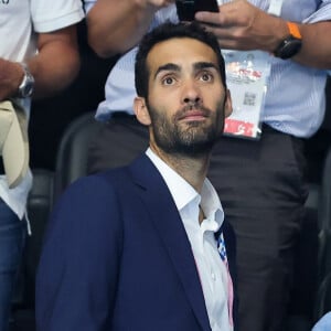 En tant que président de la comission des athlètes des Jeux Olympiques de Paris 
Martin Fourcade - Célébrités assistent à la victoire de Léon Marchand qui devient champion Olympique sur 400 m 4 nages lors des Jeux Olympiques de Paris à La Defense Arena à Nanterre. © Dominique Jacovides-Pierre Perusseau/Bestimage 