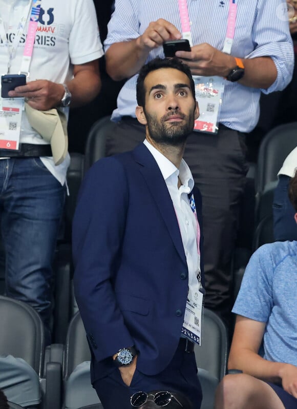 En tant que président de la comission des athlètes des Jeux Olympiques de Paris 
Martin Fourcade - Célébrités assistent à la victoire de Léon Marchand qui devient champion Olympique sur 400 m 4 nages lors des Jeux Olympiques de Paris à La Defense Arena à Nanterre. © Dominique Jacovides-Pierre Perusseau/Bestimage 