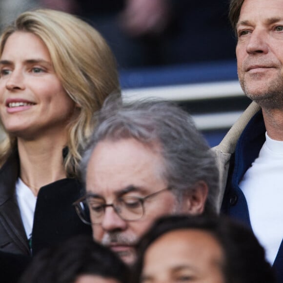 Alice Taglioni et son compagnon Laurent Delahousse - Célébrités dans les tribunes de la demi-finale retour de Ligue des champions entre le PSG face au Borussia Dortmund (0-1) au Parc des Princes à Paris le 7 mai 2024. © Cyril Moreau/Bestimage