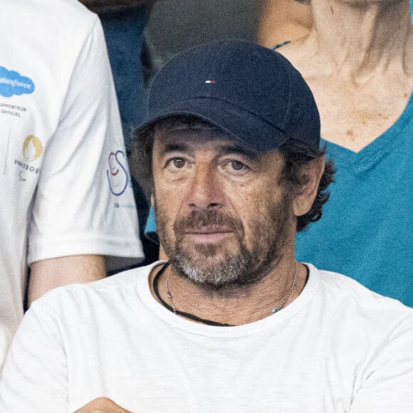 Il a pu admirer les exploits de Léon Marchand

Patrick Bruel et son amie Clémence assistent aux épreuves de natation lors des Jeux Olympiques de Paris 2024 (JO) à La Défense Arena à Nanterre le 2 aout 2024. © Perusseau-Jacovides/Bestimage