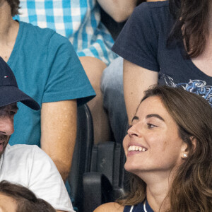 Patrick Bruel et son amie Clémence assistent aux épreuves de natation lors des Jeux Olympiques de Paris 2024 (JO) à La Défense Arena à Nanterre le 2 aout 2024. © Perusseau-Jacovides/Bestimage