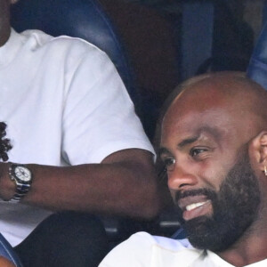 Teddy Riner et sa femme Luthna Plocus en tribunes pendant l'épreuve finale de football opposant la France à l'Espagne lors des Jeux Olympiques de Paris 2024 (JO) au Parc des Princes, à Paris, France, le 9 août 2024. © Jacovides-Perusseau/Bestimage 