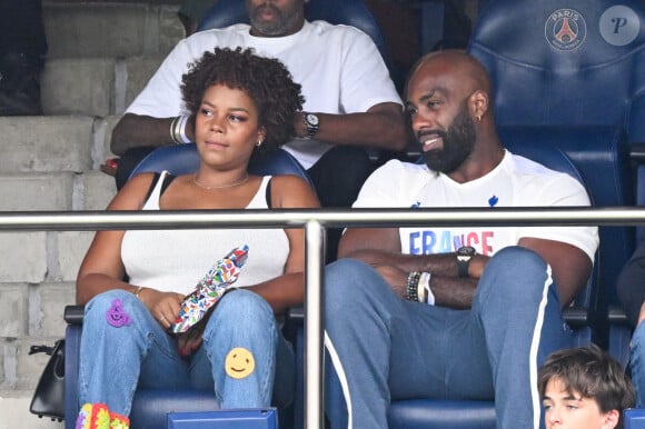 Teddy Riner et sa femme Luthna Plocus en tribunes pendant l'épreuve finale de football opposant la France à l'Espagne lors des Jeux Olympiques de Paris 2024 (JO) au Parc des Princes, à Paris, France, le 9 août 2024. © Jacovides-Perusseau/Bestimage 