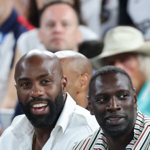 Teddy Riner, Omar Sy - Les célébrités en tribunes pendant la finale de basketball opposant les Etats-Unis à la France (98-87) lors des Jeux Olympiques de Paris 2024 (JO) à l'Arena Bercy, à Paris, France, le 10 août 2024. © Jacovides-Perusseau/Bestimage 