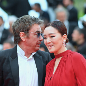 Jean-Michel Jarre et Gong Li partagent leur vie entre la France et la Chine.
Jean-Michel Jarre et Gong Li sur le tapis rouge d'Indiana Jones et le cadran du destin lors du 76ème festival de Cannes au Palais des Festivals le 18 mai 2023 à Cannes, France. Photo par Franck Castel/ABACAPRESS.COM