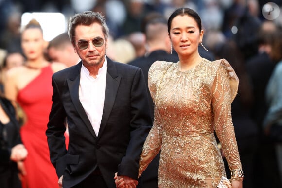 Jean-Michel Jarre et Gong Li assistent à la projection de "Pain And Glory (Dolor Y Gloria/Douleur Et Gloire)" lors du 72e Festival de Cannes annuel, le 17 mai 2019 à Cannes, en France. Photo par Shootpix/ABACAPRESS.COM