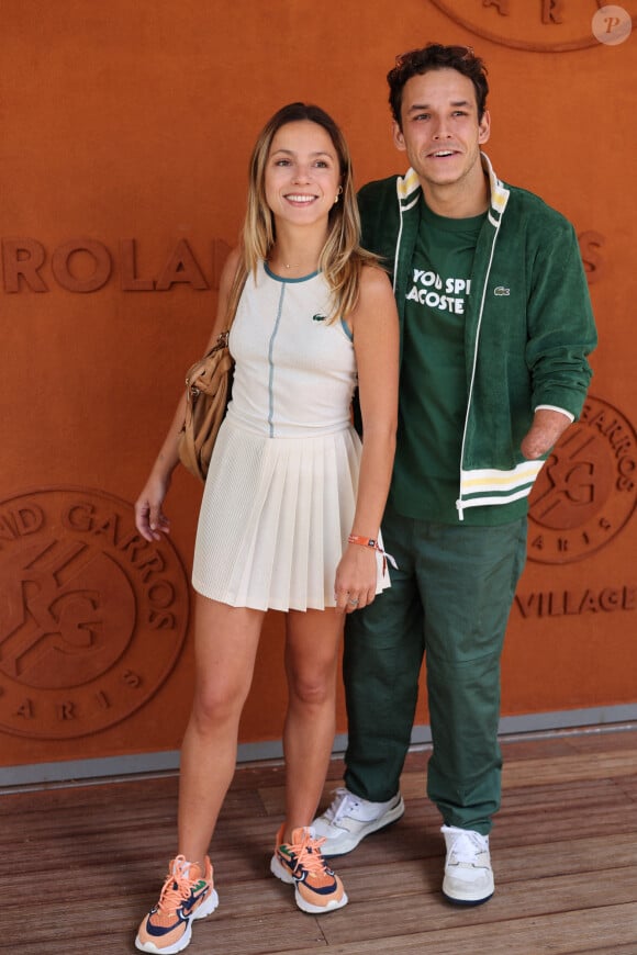 Théo Curin et sa compagne Marie-Camille Fabas - Célébrités au village lors des Internationaux de France de tennis de Roland Garros 2024 à Paris le 9 juin 2024. 