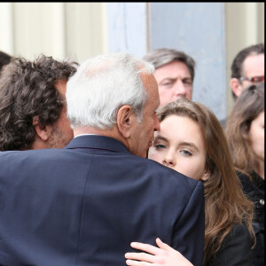 Patrice Laffont et ses enfants lors des obsèques de son père Robert Laffont en l'église Saint-Sulpice à Paris.