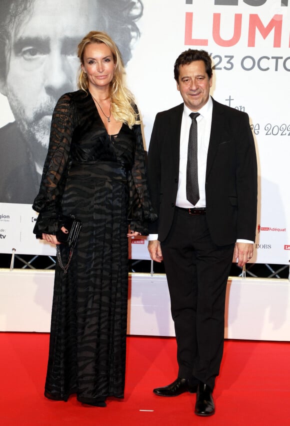 Laurent Gerra et sa femme Christelle Bardet - Photocall lors de la cérémonie d'ouverture de la 14ème édition du Festival Lumière 2022 à la Halle Tony Garnier à Lyon le 15 octobre 2022. © Domnique Jacovides / Bestimage