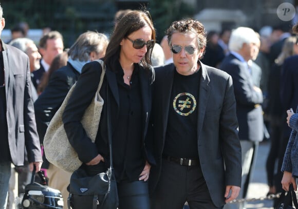 Philippe Vandel et sa femme Dorothée Olliéric - Obsèques de Roger Auque en l'église Saint-Germain-des-Près à Paris le 12 septembre 2014.