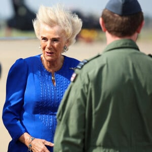 Le vent était également au rendez-vous et a littéralement mis à mal son impeccable brushing...
La Reine Camilla, Commodore honoraire de l'air, lors de sa visite à RAF Leeming, Northallerton, pour rencontrer le personnel militaire et leurs familles et s'informer sur l'aide sociale qui leur est offerte, vendredi 6 septembre 2024.
Photo par Phil Noble/PA Wire/ABACAPRESS.COM