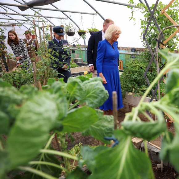 La Reine Camilla, Commodore honoraire de l'armée de l'air, visite les jardins familiaux lors de sa visite à la RAF Leeming, Northallerton, pour rencontrer les militaires et leurs familles et s'informer sur l'aide sociale qui leur est offerte, le vendredi 6 septembre 2024.
Photo par Phil Noble/PA Wire/ABACAPRESS.COM