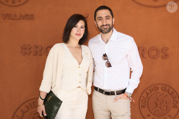 Jimmy Mohamed et sa femme Souailla au village lors des Internationaux de France de tennis de Roland Garros 2024, à Paris, France, le 26 mai. © Jacovides-Moreau/Bestimage