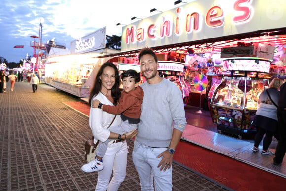 Karine Lima avec son compagnon Paul et leur fils Liam lors de L'inauguration de la fête à NeuNeu dans le Bois de Boulogne à Paris, France, le 6 septembre 2024. © Cédric Perrin/Bestimage