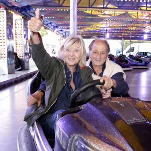 Mais ausi organsiée pour la bonne cause, Chantal Ladesou étant parraine d'une association 
Chantal Ladesou et son mari Michel Ansault lors de L'inauguration de la fête à NeuNeu dans le Bois de Boulogne à Paris, France, le 6 septembre 2024. © Cédric Perrin/Bestimage