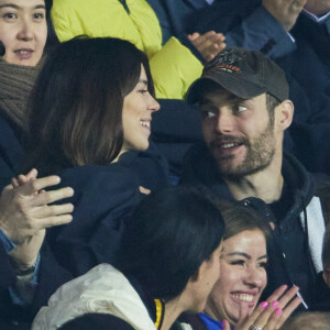 Exclusif - Louis Sarkozy et sa femme Natali Husic - en tribunes du match de Ligue 1 Uber Eats "PSG contre Reims" (1-1) au Parc des Princes à Paris le 29 janvier 2023. 