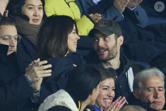 Exclusif - Louis Sarkozy et sa femme Natali Husic - en tribunes du match de Ligue 1 Uber Eats "PSG contre Reims" (1-1) au Parc des Princes à Paris le 29 janvier 2023. 