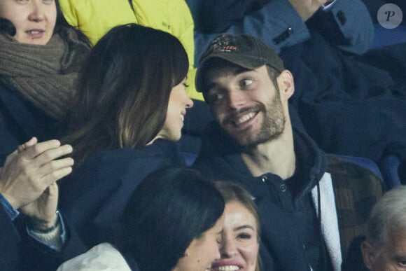 Exclusif - Louis Sarkozy et sa femme Natali Husic - en tribunes du match de Ligue 1 Uber Eats "PSG contre Reims" (1-1) au Parc des Princes à Paris le 29 janvier 2023. 