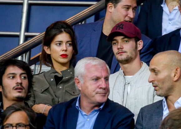 Louis Sarkozy et sa femme Natali Husic dans les tribunes lors du match de Ligue 1, Paris Saint-Germain (PSG) vs Toulouse FC (TFC) au Parc des Princes à Paris, France, le 20 août 2017.