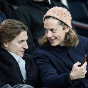 Pierre Sarkozy, Jean Sarkozy dans les tribunes lors du match de Champions League "PSG - Galatasaray (5-0)" au Parc des Princes à Paris, le 11 décembre 2019. © Cyril Moreau/Bestimage 