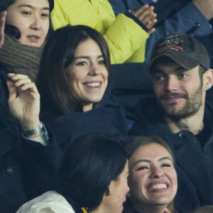 Exclusif - Louis Sarkozy et sa femme Natali Husic - People en tribunes du match de Ligue 1 Uber Eats "PSG contre Reims" (1-1) au Parc des Princes à Paris le 29 janvier 2023. 