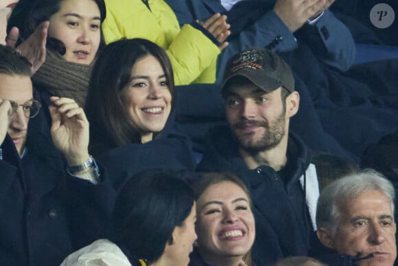 Exclusif - Louis Sarkozy et sa femme Natali Husic - People en tribunes du match de Ligue 1 Uber Eats "PSG contre Reims" (1-1) au Parc des Princes à Paris le 29 janvier 2023. 