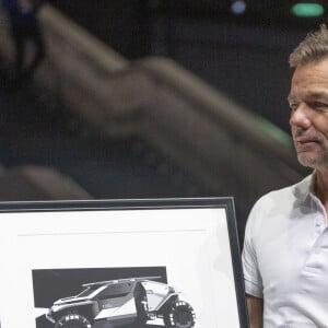 Sébastien Loeb, le jour de son 50ème anniversaire, présente la nouvelle Lamborghini Lambo V12 Vision Gran Turismo (819 chevaux) lors du "Geneva International Motor Show" à Genève, le 26 février 2024.