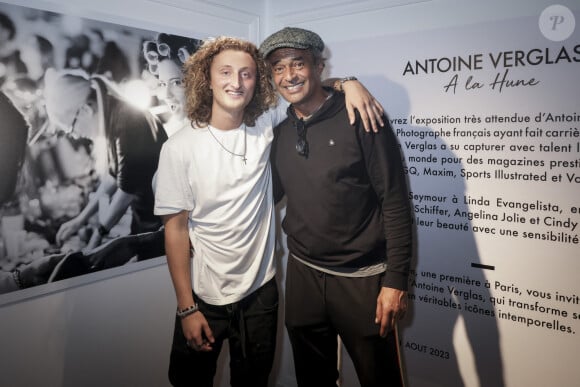 Exclusif - Joalukas Noah et son père Yannick Noah - Isabelle Camus a organisé pour son ami photographe Antoine Verglas, le vernissage de l'exposition éphémère de ses photographies à la Galerie La Hune en partenariat avec YellowKorner le 4 juillet 2023. © Jack Tribeca/Bestimage