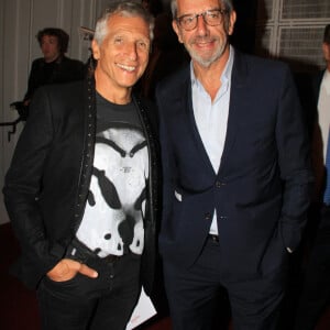 Nagui et Michel Cymes lors de la soirée de gala "Enfance Majuscule" au profit de l'enfance maltraitée à la Salle Gaveau à Paris le 7 octobre 2024. © Philippe Baldini / Bestimage