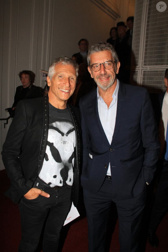 Nagui et Michel Cymes lors de la soirée de gala "Enfance Majuscule" au profit de l'enfance maltraitée à la Salle Gaveau à Paris le 7 octobre 2024. © Philippe Baldini / Bestimage