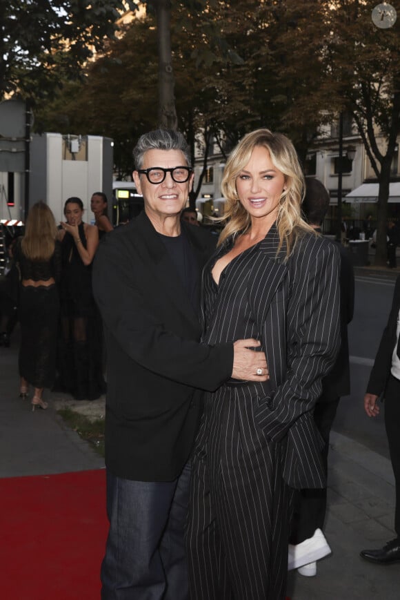 Marc Lavoine et sa compagne Adriana Karembeu arrivant au "Concerto pour la Paix" organisé par Omar Harfouch au Théâtre des Champs Élysées à Paris, France, le 18 Septembre 2024. © Perusseau / Tribeca / Bestimage 