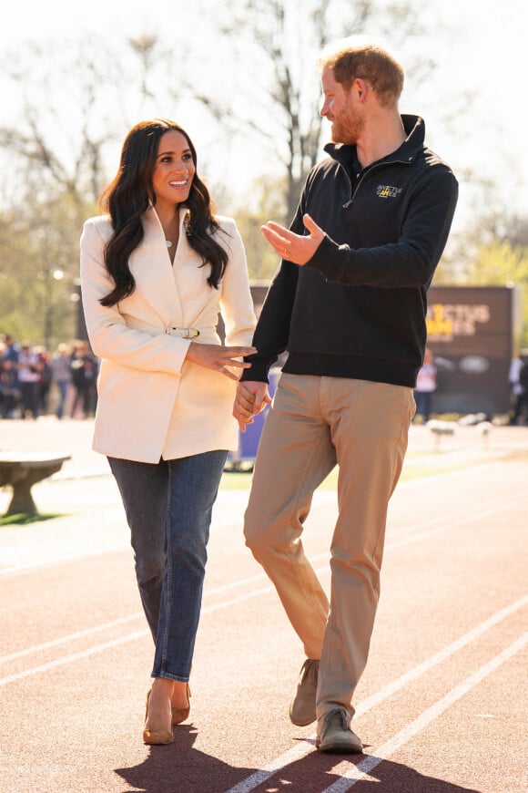 Le duc et la duchesse de Sussex assistent aux épreuves d'athlétisme des Invictus Games dans le parc d'athlétisme, au Zuiderpark de La Haye, aux Pays-Bas. Le crédit photo doit être lu comme suit : Aaron Chown/PA Wire.