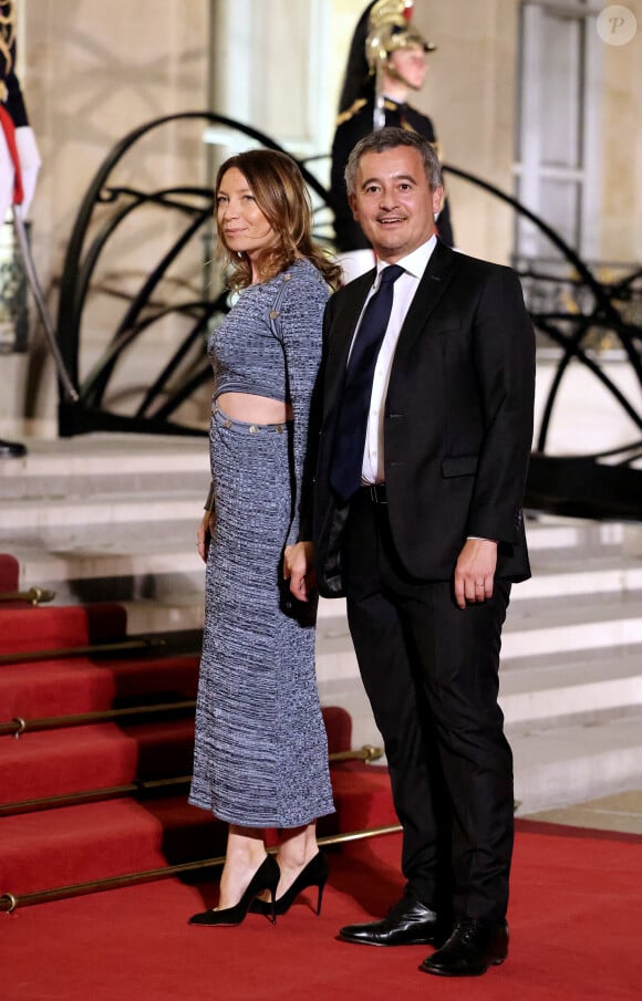 L'ancien ministre de l'Intérieur, qui a laissé sa place à Beauvau à Bruno Retailleau, lui aussi invité, a pris la pose fièrement avec la mère de ses enfants, Max-Émilien, 2 ans, et Alec, 1 an. C'est déjà en lui tenant la main que Gérald Darmanin avait quitté la place Beauveau, le 23 septembre dernier.
Gérald Darmanin et sa femme Rose-Marie Devillers arrivant au dîner d'état au palais de l'Elysée à Paris en l'honneur de la visite du roi et de la reine de Belgique en France le 14 octobre 2024. © Dominique Jacovides / Bestimage