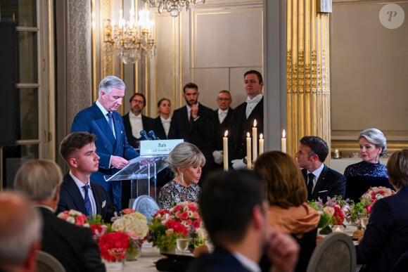 Le président Emmanuel Macron, Brigitte Macron, le roi Philippe et la reine Mathilde de Belgique lors du dîner d'état au palais de l'Elysée à Paris en l'honneur du couple royal de Belgique, en visite d'état à Paris le 14 octobre 2024. © Frédéric Andrieu / Bestimage