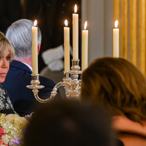 Le président Emmanuel Macron, Brigitte Macron, le roi Philippe et la reine Mathilde de Belgique lors du dîner d'état au palais de l'Elysée à Paris en l'honneur du couple royal de Belgique, en visite d'état à Paris le 14 octobre 2024. © Frédéric Andrieu / Bestimage