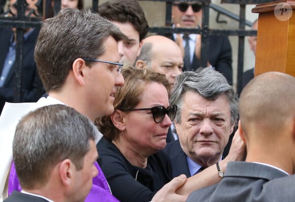 Cendrine Dominguez, Jean-Louis Borloo - Sorties des obsèques de Patrice Dominguez en la basilique Sainte Clotilde à Paris. Le 16 avril 2015