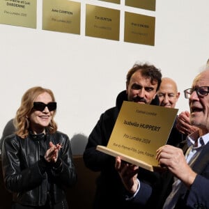 Rachida Dati, Ministre de la Culture, Isabelle Huppert, Grégory Doucet, Maire de Lyon, Thierry Frémaux - I.Huppert a dévoilé une plaque à son nom sur l'une des façades de l'institut Lumière dédié aux Prix Lumiére dans le cadre de la 16ème édition du Festival Lumière de Lyon, France, le 19 octobre 2024. © Dominic Jacovides/Bestimage  Isabelle Huppert attends the Isabelle Huppert's Plaque Unvelling during the 16th Film Festival Lumiere In Lyon on October 19, 2024 in Lyon, France.