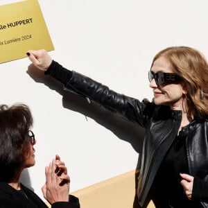 Rachida Dati, Ministre de la Culture, Isabelle Huppert, Grégory Doucet, Maire de Lyon - I.Huppert a dévoilé une plaque à son nom sur l'une des façades de l'institut Lumière dédié aux Prix Lumiére dans le cadre de la 16ème édition du Festival Lumière de Lyon, France, le 19 octobre 2024. © Dominic Jacovides/Bestimage  Isabelle Huppert attends the Isabelle Huppert's Plaque Unvelling during the 16th Film Festival Lumiere In Lyon on October 19, 2024 in Lyon, France.